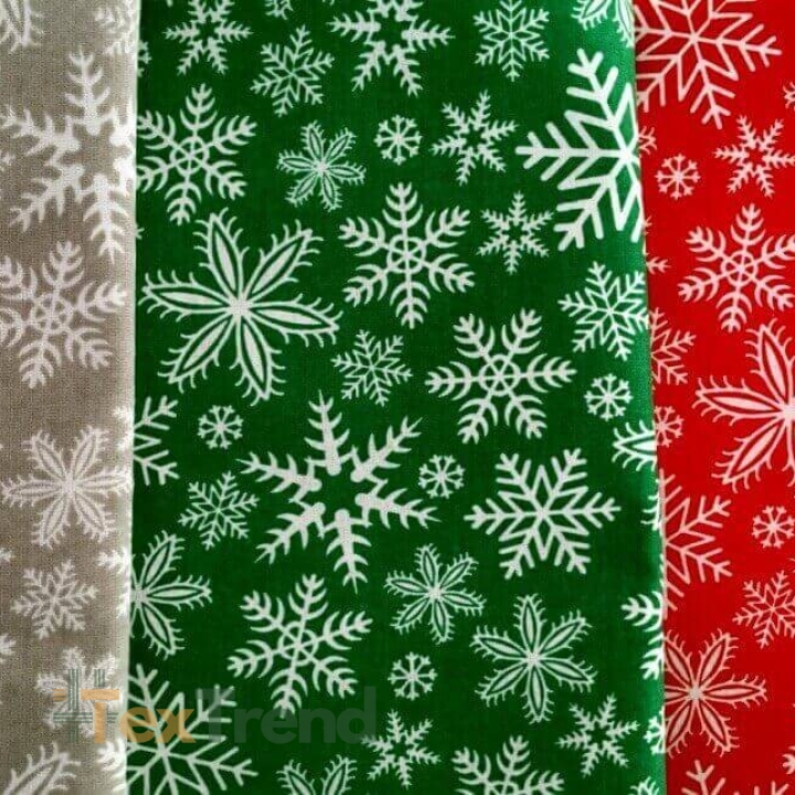 Baumwolle 100% Weihnachtsmuster weiße Schneeflocken auf grünem Hintergrund  