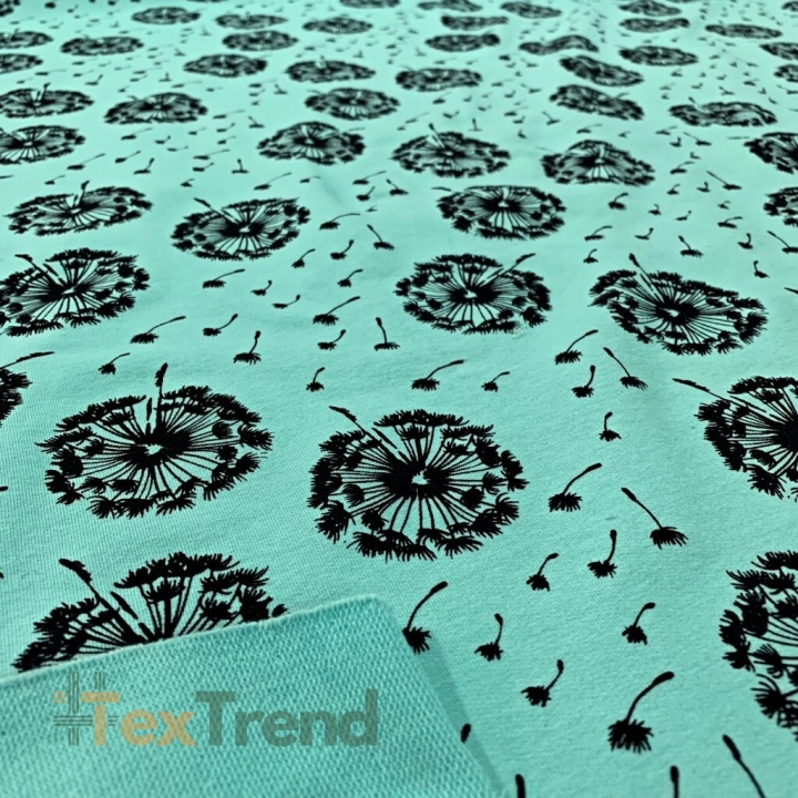 Sweatshirtstoff Loop - schwarze Pusteblumen auf mintgrünem Hintergrund  