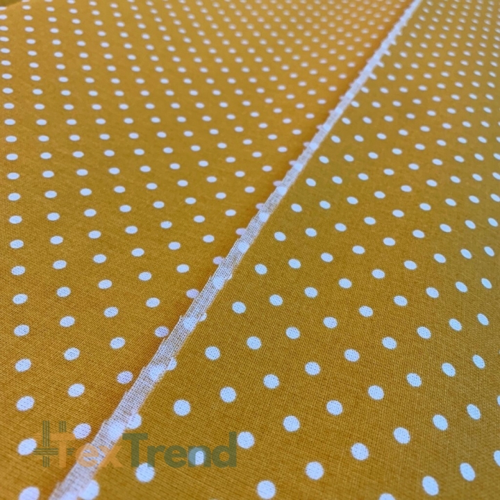 Baumwolle 100% Punkte 4mm weiß auf senfgelbem Hintergrund  