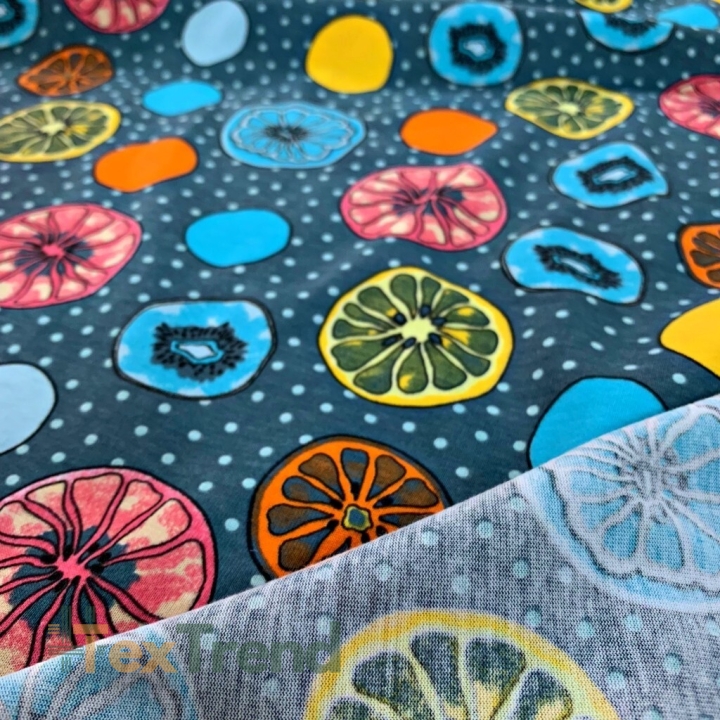 Jersey-Stoff bunte Zitronen auf blau-grauem Hintergrund  