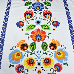 Baumwolle 100% Łowicz Folk Muster mit dunkelblauem Rand auf weißem Hintergrund  