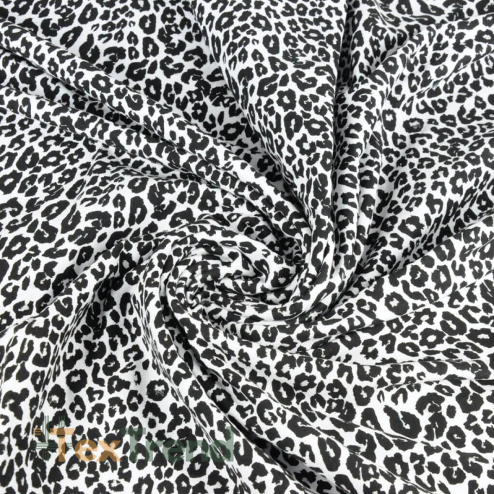 Einfarbiger Sweatstoff - glitzerndes Leopardenmuster schwarz auf weißem Hintergrund  