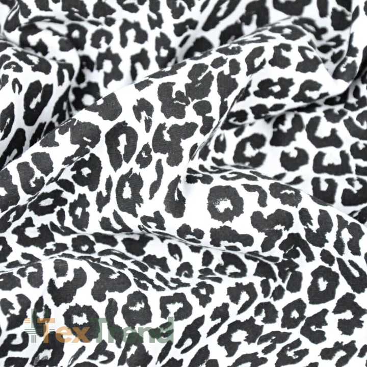Einfarbiger Sweatstoff - glitzerndes Leopardenmuster schwarz auf weißem Hintergrund  
