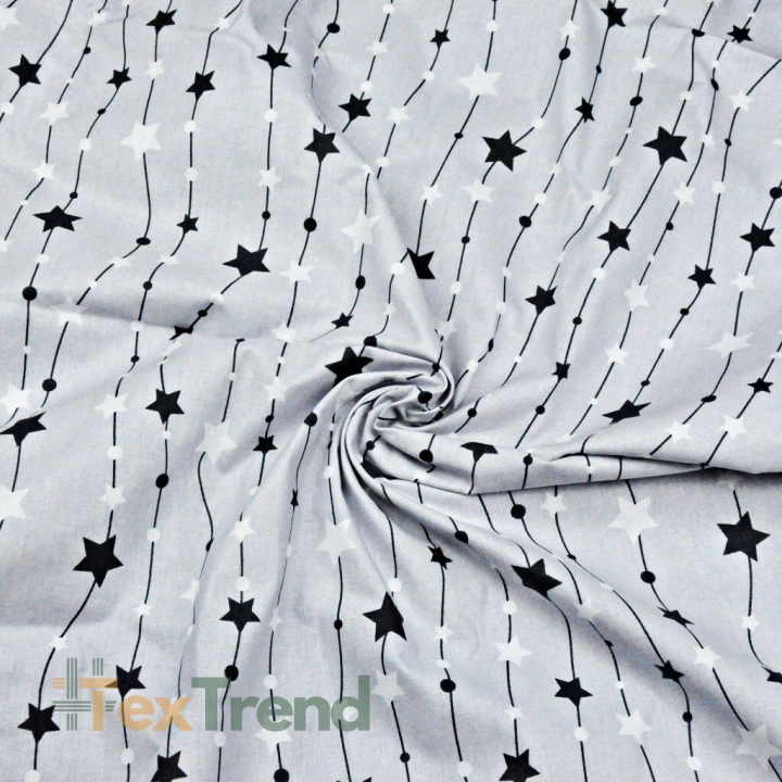 Baumwolle 100% Sterne an einer Kette schwarz-weiß auf grauem Hintergrund