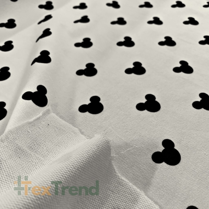 Jersey-Stoff - schwarze Micky Mäuse auf cremefarbenem Hintergrund  