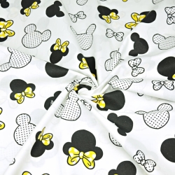 Baumwolle 100% MIKI schwarz-gelb mit Schleife auf weißem Hintergrund  