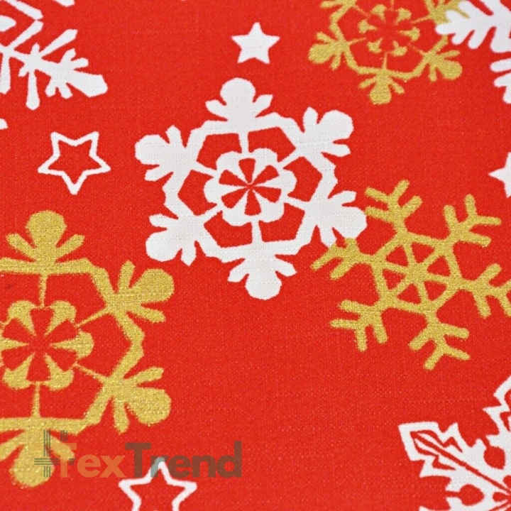 Dekostoff weiß-goldene Schneeflocken auf rotem Hintergrund  