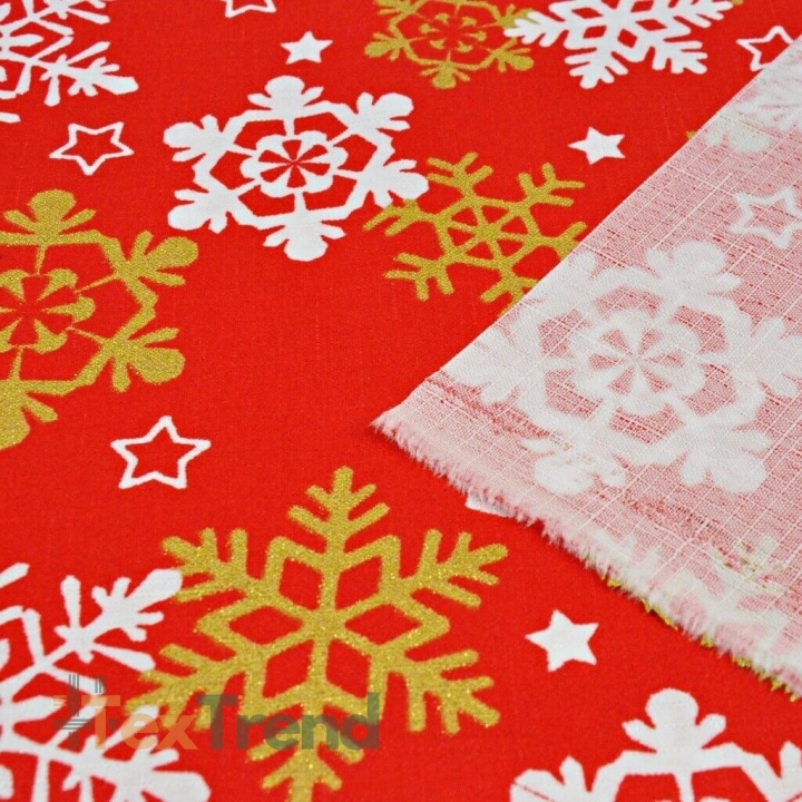 Dekostoff weiß-goldene Schneeflocken auf rotem Hintergrund  