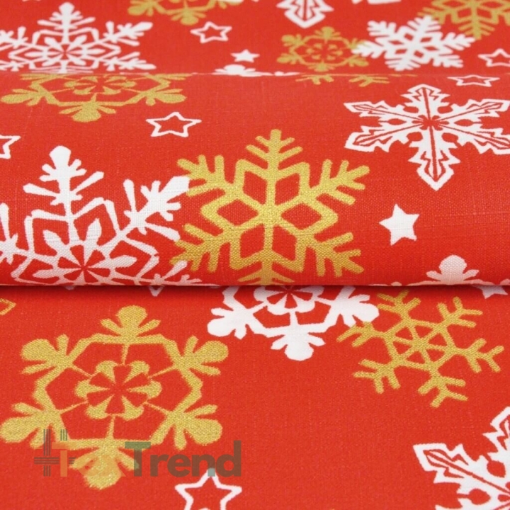 Dekostoff weiß-goldene Schneeflocken auf rotem Hintergrund  