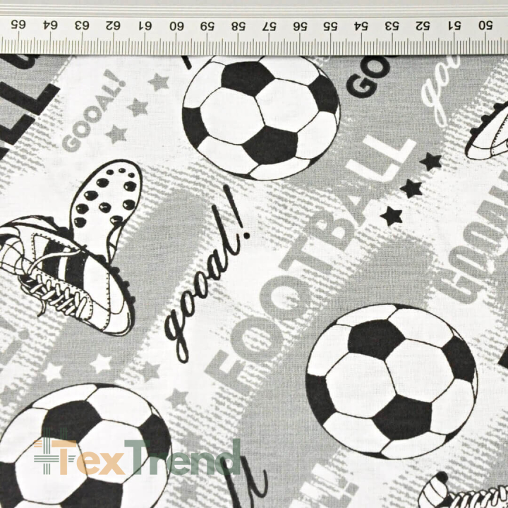 100% Baumwolle Fußball auf grauem Hintergrund  