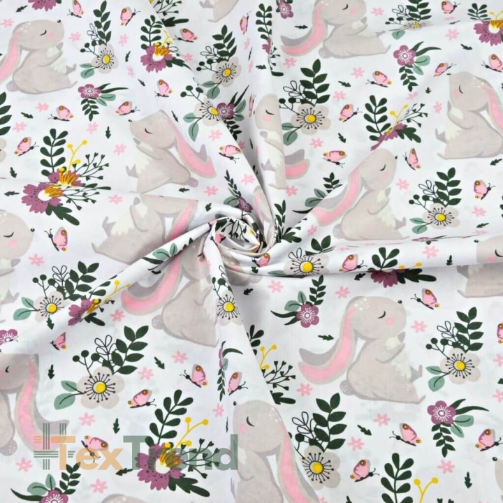 Baumwolle 100% Kaninchen auf grün-lila Wiese auf weißem Hintergrund  