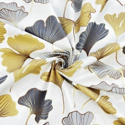 100% Baumwolle mit Ginkgo in grau-gold auf weißem Hintergrund