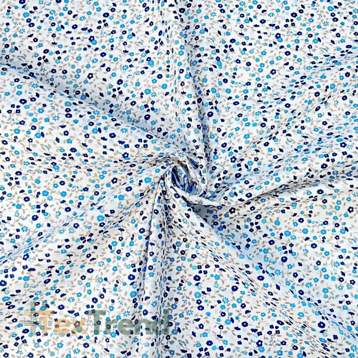 Baumwolle 100% Wiese blau-dunkelblau auf weißem Hintergrund  