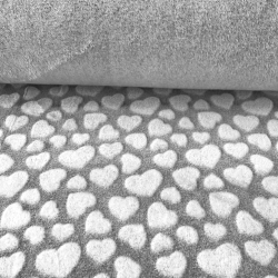 Fleece Plus beidseitig weiße Herzen auf grauem Hintergrund.  