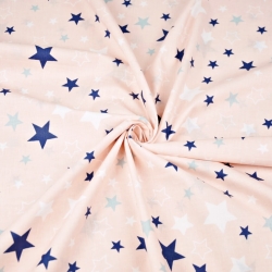 Baumwolle 100% Sternbild weiß-dunkelblau auf aprikosenfarbenem Hintergrund  