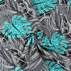 Baumwolle 100% Monstera-Blätter türkis-grau auf schwarzem Hintergrund  