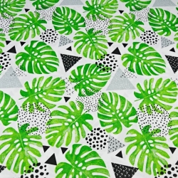 Baumwolle 100% grüne Monstera-Blätter mit grauen Dreiecken auf weißem Hintergrund  