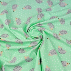 Jersey-Stoff mit Igeln auf mintfarbenem Hintergrund  