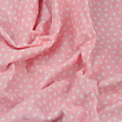 Baumwoll-Musselin Herzen auf rosa Hintergrund  