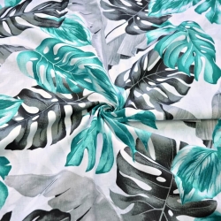 Baumwolle 100% Monstera- und Bananenblätter grau-türkis auf weißem Hintergrund  