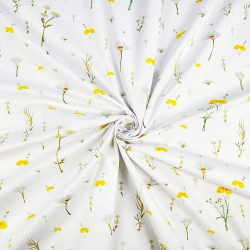 100% Baumwolle mit gelben Wiesenblumen auf weißem Hintergrund  