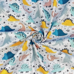 100% Baumwolle mit bunten Dinosauriern auf grauem Hintergrund  