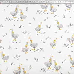 100% Baumwolle mit Gänsen und gelber Schleife auf weißem Hintergrund  