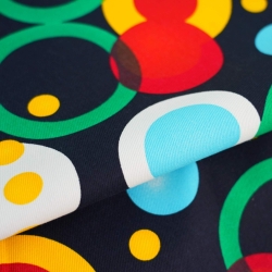 Liegegewebe bunte Kreise auf navyblauem Hintergrund  