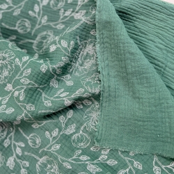 Muslin Double Gauze bedruckte Blumenumrisse auf salbeigrünem Hintergrund  