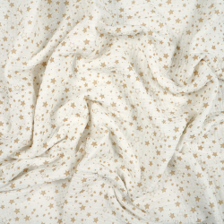Bedruckter Double Gauze Musselin mit beigen Sternen auf weißem Hintergrund
