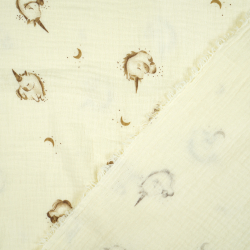 Doppel-Gaze mit Einhorn-Druck auf ecrufarbenem Hintergrund