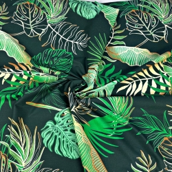 Baumwolle 100% Monstera- und Bananenblätter mit Blumen auf grünem Hintergrund  