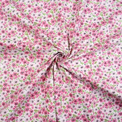 100% Baumwolle rosa Wiese auf weißem Hintergrund  