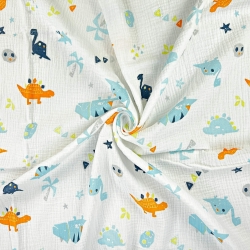 Musselin Double Gauze bedruckt mit orange-türkisen Dinosauriern und Palmen  