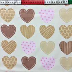 Baumwolle 100% Herzen gemustert beige auf ecrufarbenem Hintergrund  