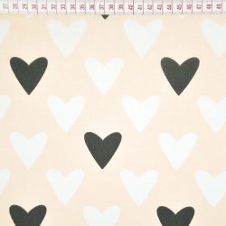 Baumwolle 100% Herzen schwarz-weiß auf aprikosenfarbenem Hintergrund  