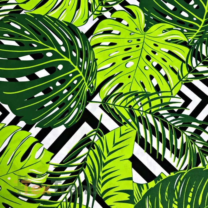 Baumwolle 100% grüne Monstera-Blätter auf schwarzen Rauten auf weißem Hintergrund.  