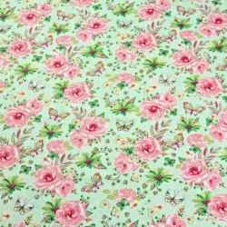 Baumwolle 100% Blumen mit Schmetterlingen rosa-grün auf grünem Hintergrund  