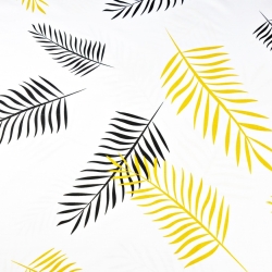 100% Baumwolle schwarz-orange Blätter auf weißem Hintergrund  