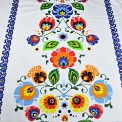 Baumwolle 100% Łowicz Folk Muster mit dunkelblauem Rand auf weißem Hintergrund  