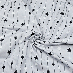 Baumwolle 100% Sterne an einer Kette schwarz-weiß auf grauem Hintergrund