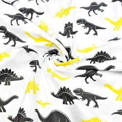 Baumwolle 100% Dinosaurier gelb-schwarz auf weißem Hintergrund  