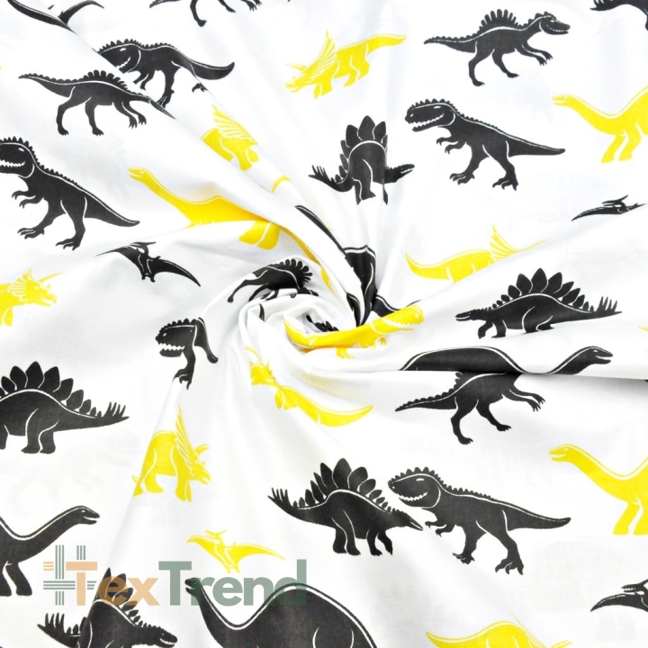 Baumwolle 100% Dinosaurier gelb-schwarz auf weißem Hintergrund  