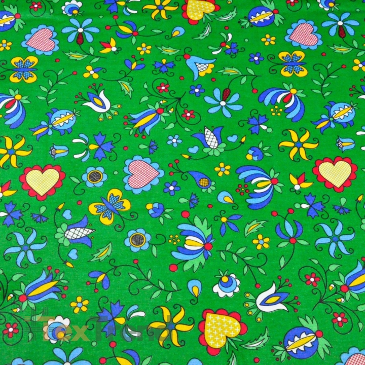 Baumwolle 100% Kaschubisches Muster blau auf grünem Hintergrund  