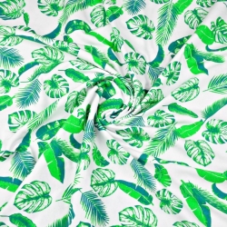 Jersey-Stoff mit grünen Blättern auf weißem Hintergrund  