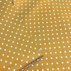 Baumwolle 100% Punkte 4mm weiß auf senfgelbem Hintergrund  