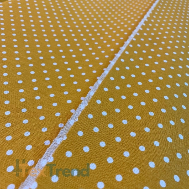 Baumwolle 100% Punkte 4mm weiß auf senfgelbem Hintergrund  