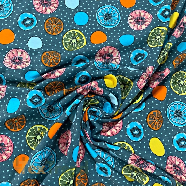 Jersey-Stoff bunte Zitronen auf blau-grauem Hintergrund  
