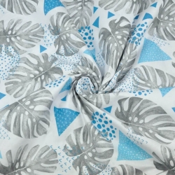 100% Baumwolle - graue Monstera-Blätter mit türkisfarbenen Dreiecken auf weißem Hintergrund  
