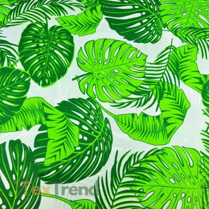 100% Baumwolle - große grüne Monstera-Blätter auf weißem Hintergrund  